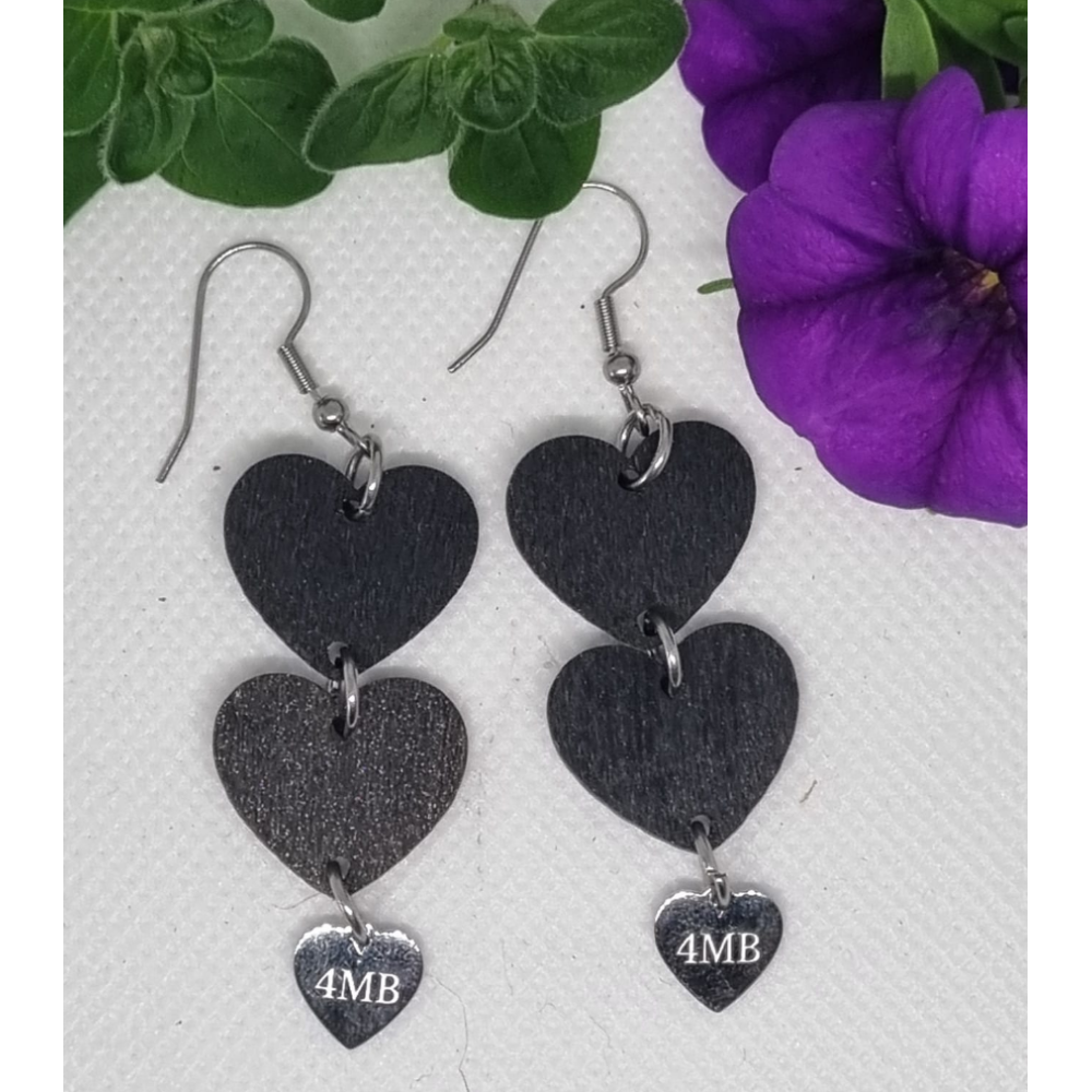 Mustat Sydänkorvakorut - Mystery Heart